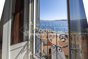 9 FARO - Porto Faro finestra su un mare d'amare Palau